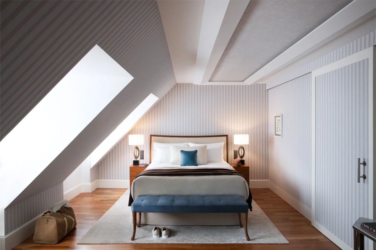 Chenot Palace Weggis – Superior Room bed with views