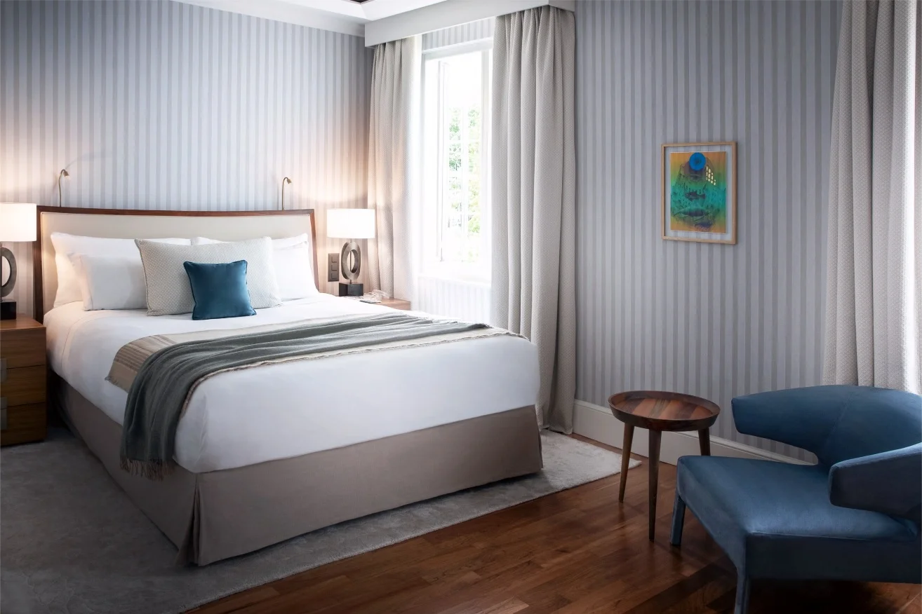 Chenot-Palace-Weggis-Nest-Room-Bed.jpg