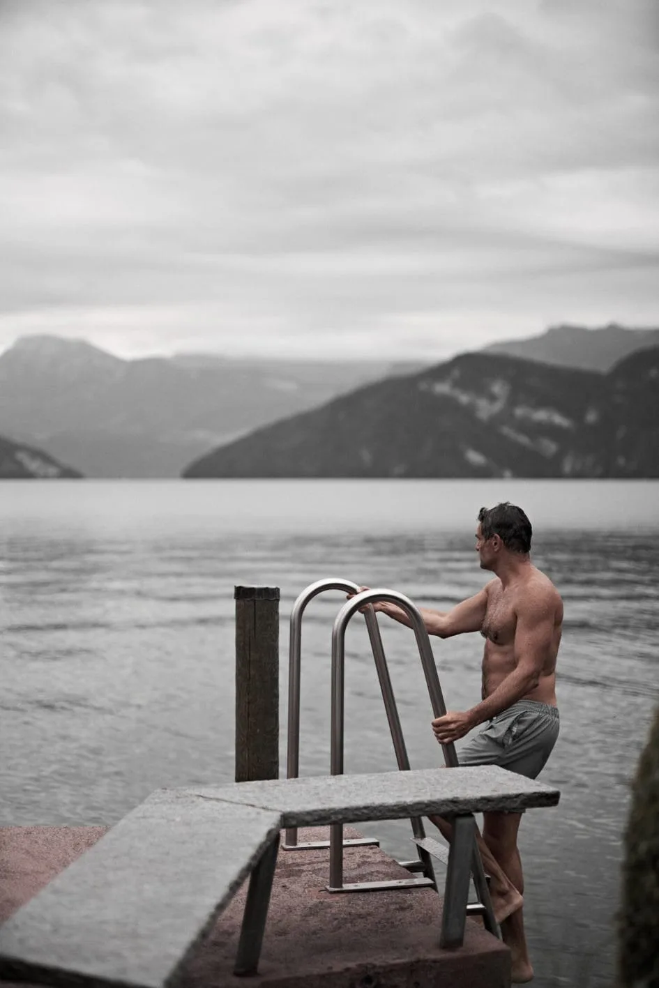 Man getting out of lake
