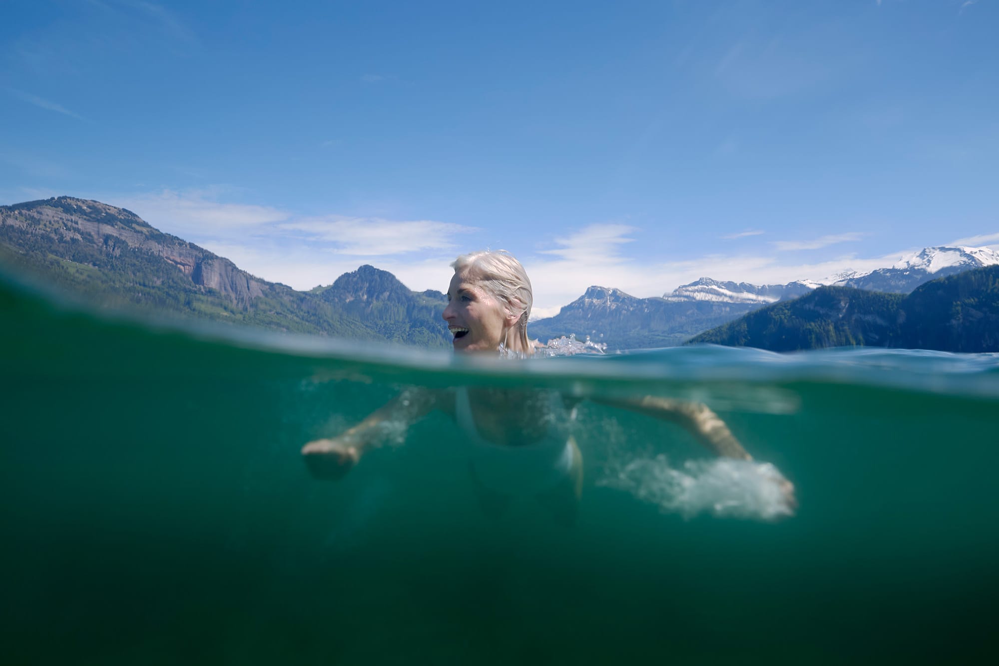 Woman swimming in Lake Lucerne
